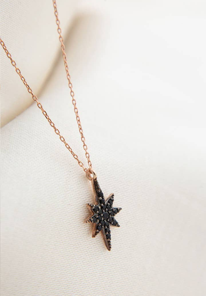 Rose Gold plated Star Necklace. Available in both clear and black crystal